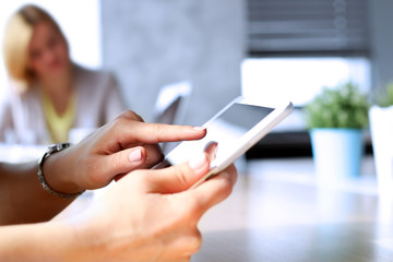 Close-up Of Business woman Analyzing Graph On Digital Tablet