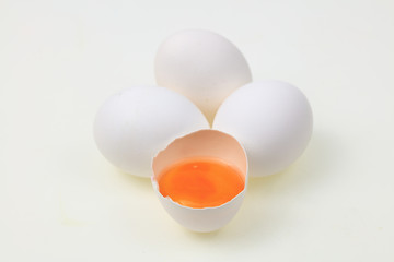 White chicken eggs, isolated on white background.