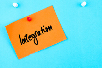 Integration written on orange paper note