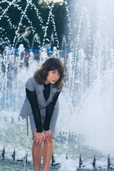 Close up portrait of a professional business woman near the fountain