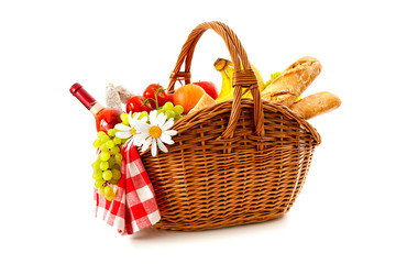 Fototapeta na wymiar picnic basket with fruit bread and wine