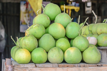 Freshness green grapefruit are selling at market.