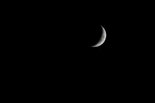 crescent moon on black background