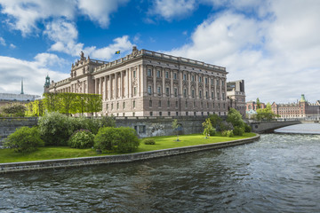 Fototapeta na wymiar Riksdag Parliament Building and Norrbro Bridge In Stockholm, Sweden.