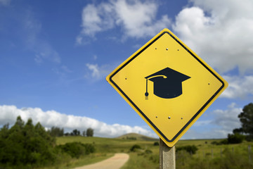Education concept road sign with college hat icon - 111412259
