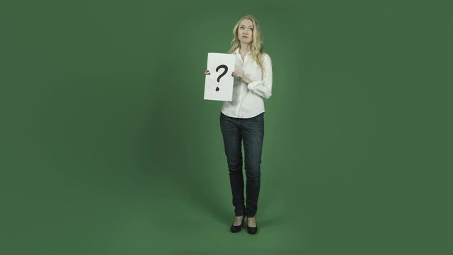 caucasian woman isolated on chroma green screen background puzzled confused question mark