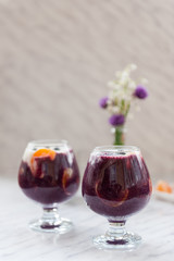 yogurt with blueberry sauce and oranges