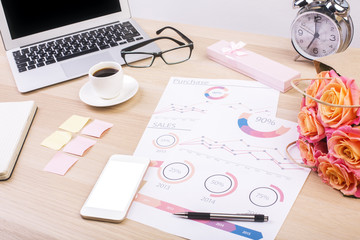 Creative desktop with business report