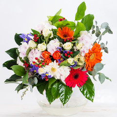 colorful bouquet with hydrangea, anthurium, gerbera, rose and ir