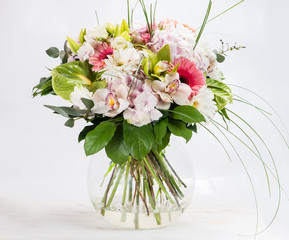 delicate bouquet with hydrangea, gerberas and other flowers in a