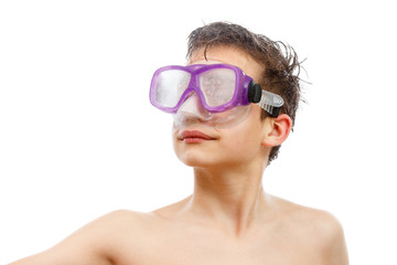 Fototapeta premium Boy diver in swimming mask with a happy face close-up portrait, isolated on white