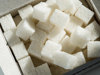 Close up shot of white refinery sugar.