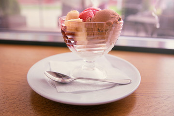 strawberry and chocolate ice cream with banana.