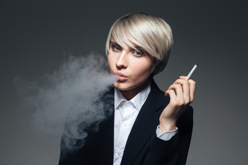 Obraz premium Stylish woman smoking