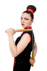 Funny woman with nunchucks isolated on white