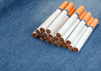 Closeup to jeans pocket with cigarettes