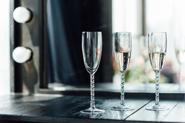 Wedding glasses filled with champagne at banquet