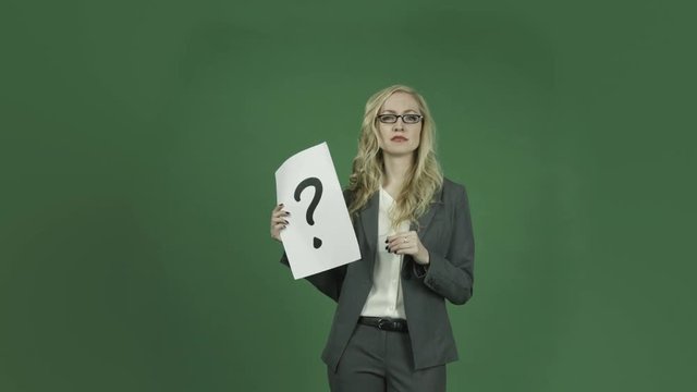 caucasian businesswoman isolated on chroma green screen background puzzled confused question mark