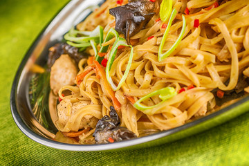 Asian noodles with mushrooms, herbs and chilli
