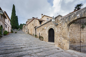 Fototapeta na wymiar Stairs to chapel in Pollensa on Mallorca.
