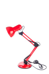 Red table top adjustable lamp isolated on white