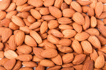 peeled almonds as a background close up