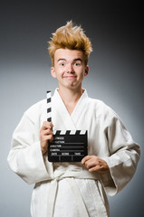 Funny karate fighter in sports concept