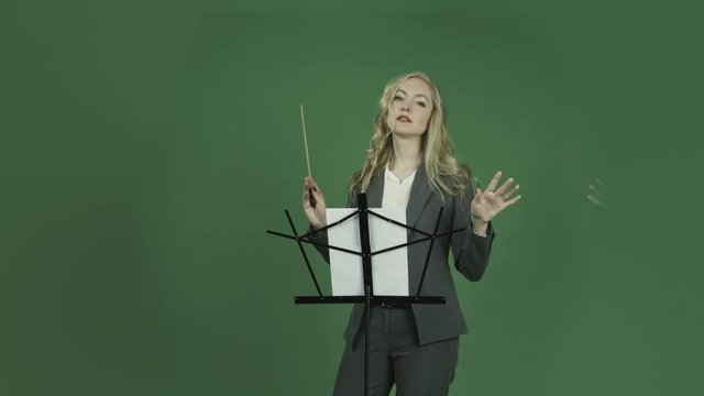 caucasian businesswoman isolated on chroma green screen background sad conductor