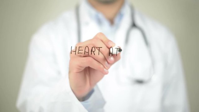 Heart Attack, Doctor writing on transparent screen