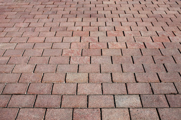 Red granite stone pavement texture