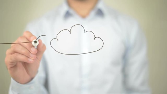 Cloud Computing Concept,  Man writing on transparent screen