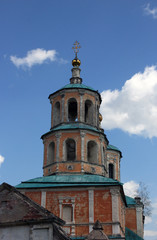Fototapeta na wymiar Old abandoned bellfry of russian orthodox church in the classica