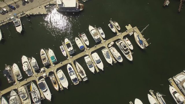 Aerial 4K. Yachts and boats docked in  harbor.Luxury yachts and boats at the  Fort Lauderdale port, Florida
