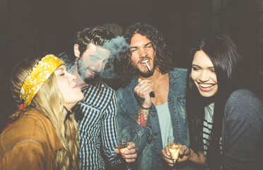 Group of friends making party outdoor. drinking and celebrating