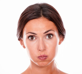 Attractive pouting brunette young woman only