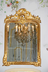 Mirror / Antique mirror with a reflection of chandelier