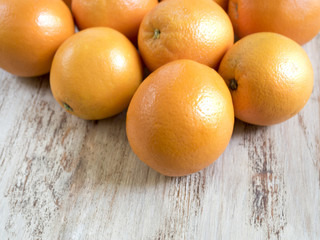 oranges on weathered wooden table