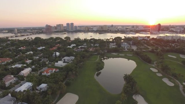 Aerial Footage. Sunset Time. Flying Above Golf Field At West Palm Beach, Florida. Florida  4K Video