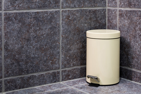 Closed trash bin in bathroom