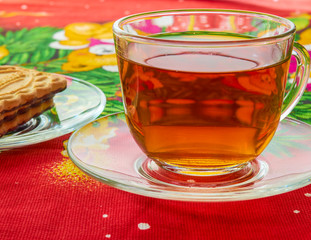 Cup with tea and biscuits