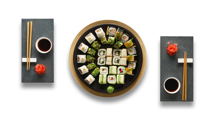Set of sushi maki and rolls isolated at white.