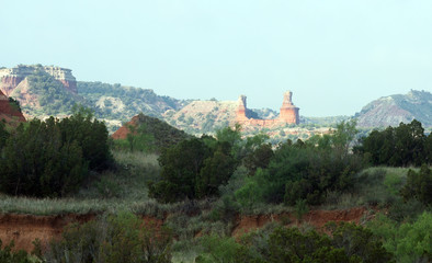 Fototapeta na wymiar View from afar on the red rocks called Lighthouse. Palo Duro Ca