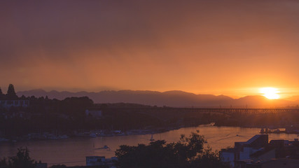 Seattle, Washington Lake Union Fire Orange Sunset Over the Olympic Mountains, Aurora Bridge, and Queen Anne Hill