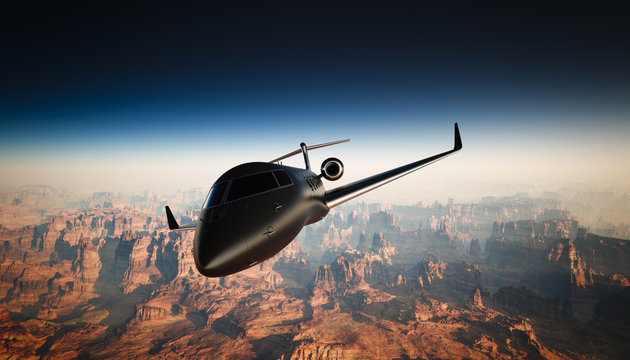 Photo of Black Matte Luxury Generic Design Private Jet Flying in Sky under the Earth Surface. Grand Canyon Background. Business Travel Picture. Horizontal, front angle view. Film Effect. 3D rendering.