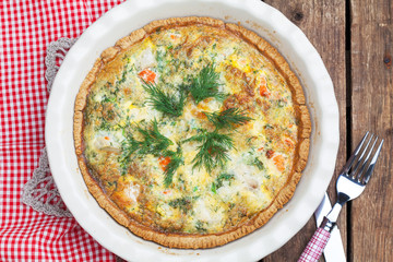 Pie with red and white fish, selective focus