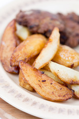 Fried potatoes close up macro shallow focus