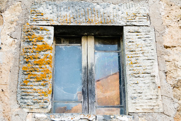 An ancient italian window made into stone