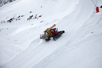 Fototapeta na wymiar Snow removal (plow) machine nearZermatt, Switzerland