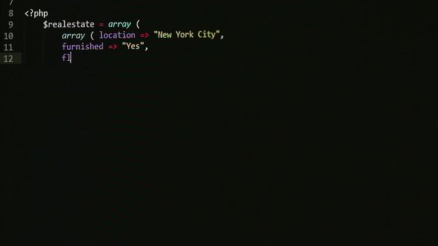 Programming a simple array in php, realestate terms, prices and locations are visible in code on the screen