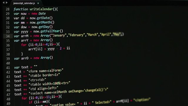 JavaScript Code programming - copy/paste adding Month and Day elements into arrays. Computer screen shot under a slight angle and with shallow depth of field.